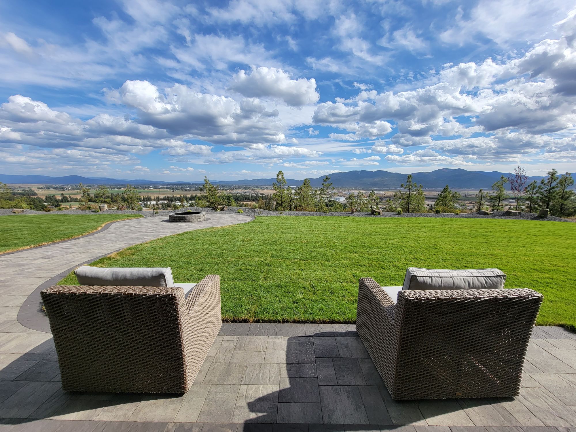 Patio view across the valley from a Timbered Ridge home in Hauser, Idaho